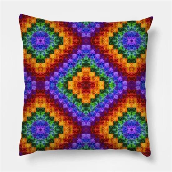 A colorful pillow with a rainbow diamond checked quilted design.